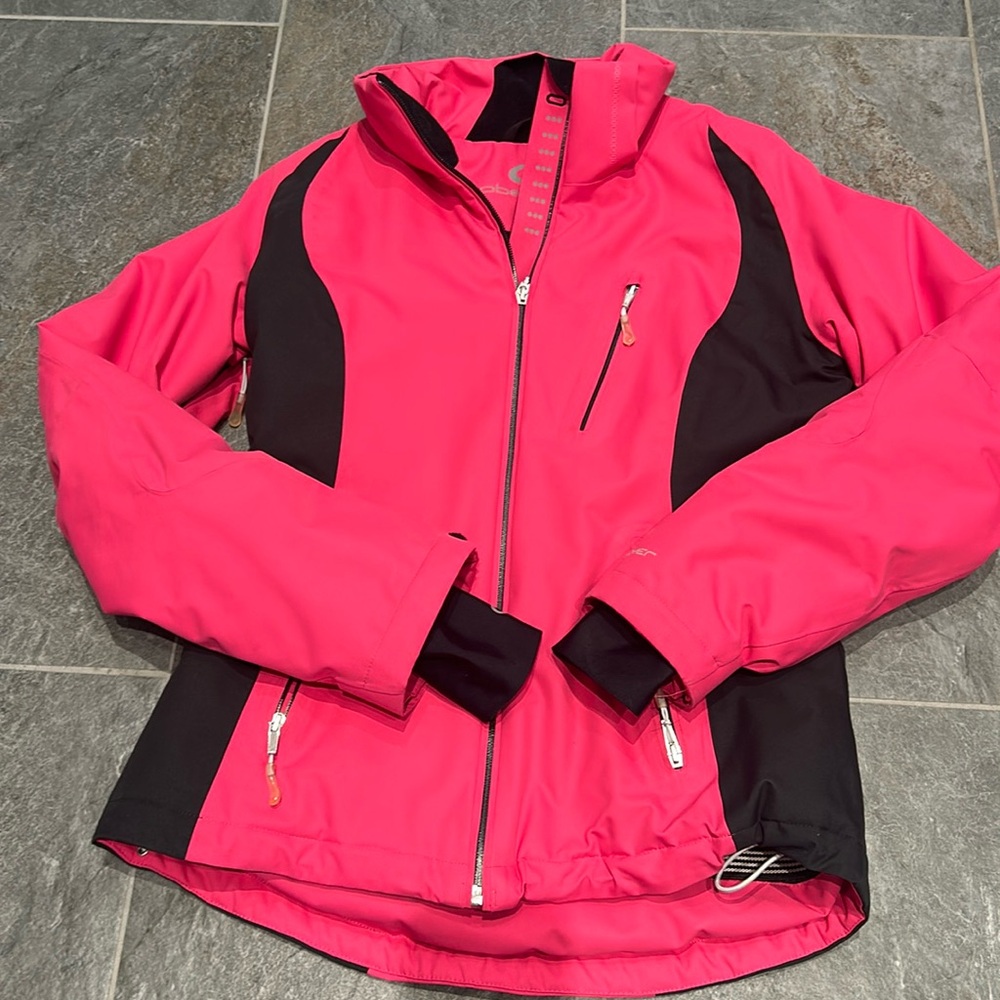 Women’s hot pink, black trim, Obermeyer size 6 ski coat with recco technology